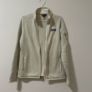 cream patagonia zip-up